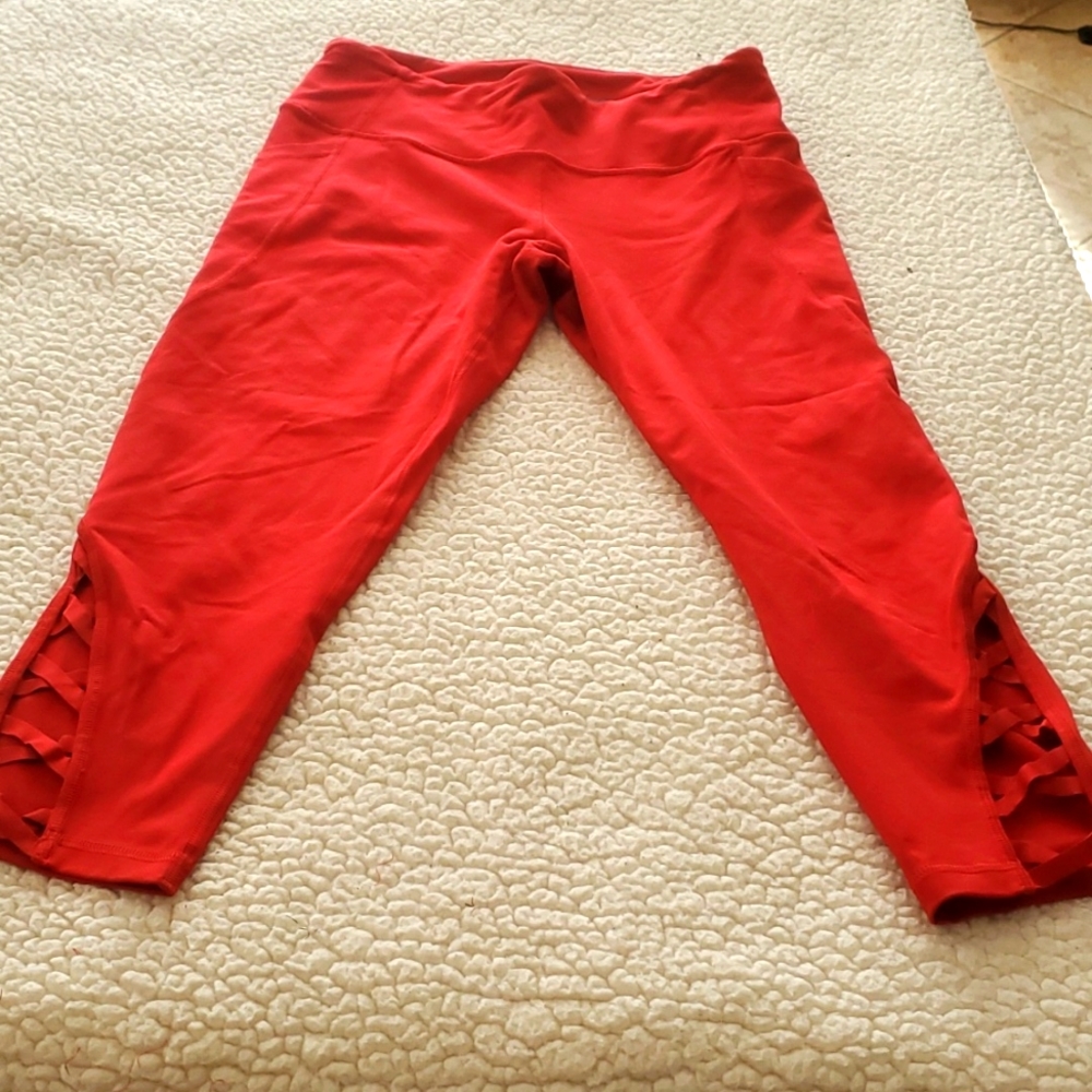 Fun red crop leggings with detailing on bottom
